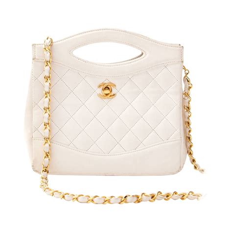 chanel cream chain bag|Chanel shoulder bag with chain.